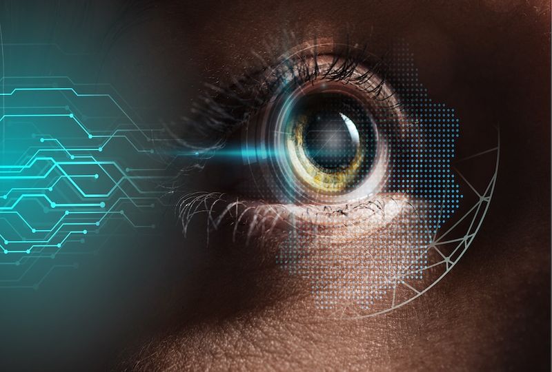 close up view of human eye with data illustration, robotic concept