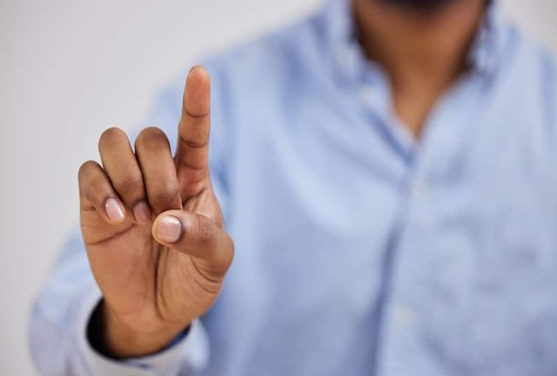 Hand, fingerprint or biometrics with a person on an interface to select an option for virtual reali