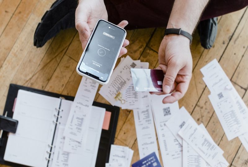 Man paying bills online via internet banking mockup